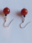 Preview: silver earrings-ear wires with carnelian and onyx beads-the colour is red and black---