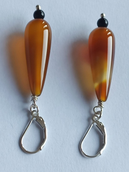 silver earrings-leverbacks with agate drops and onyx beads-the colours are amber and black---