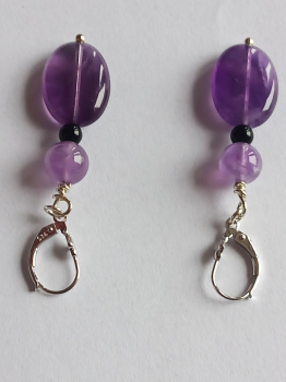 silver earrings-leverbacks with amethyst and onyx beads-the colours are purple and black---