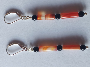 silver earrings-leverbacks with sardonyx tubes and onyx beads-the colours are red and black--