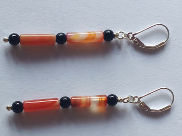 silver earrings-leverbacks with sardonyx tubes and onyx beads-the colours are red and black-