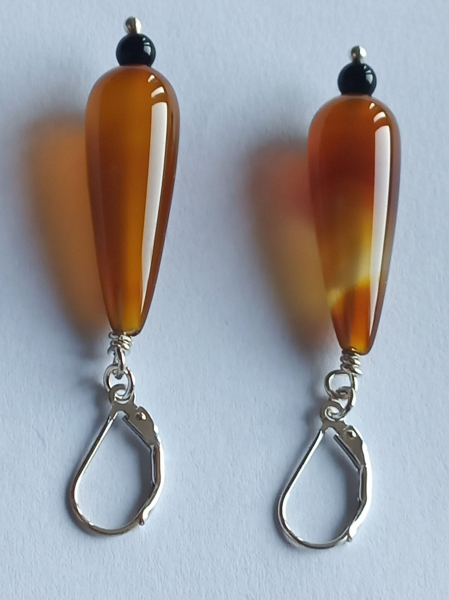 silver earrings-leverbacks with agate drops and onyx beads-the colours are amber and black---
