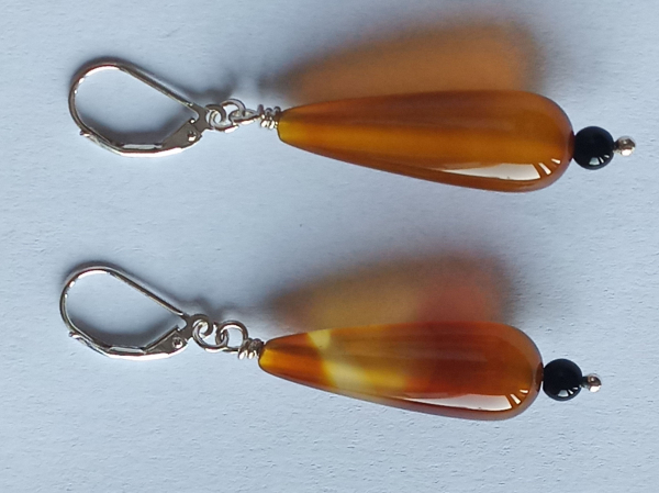 silver earrings-leverbacks with agate drops and onyx beads-the colours are amber and black--