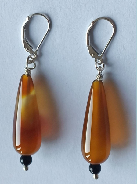 silver earrings-leverbacks with agate drops and onyx beads-the colours are amber and black