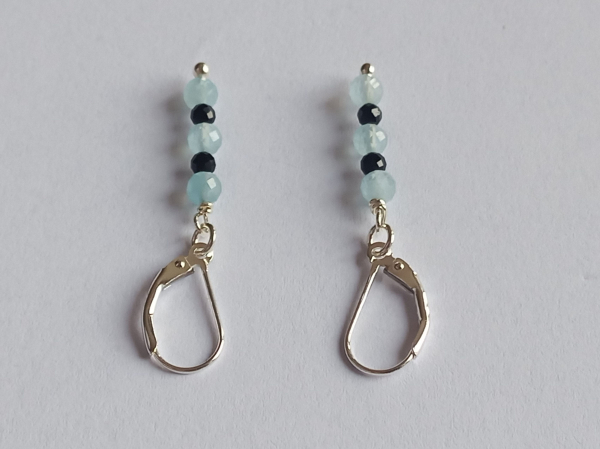 silver earrings-leverbacks with aquamarine and tourmaline beads-the colours are blue and black---