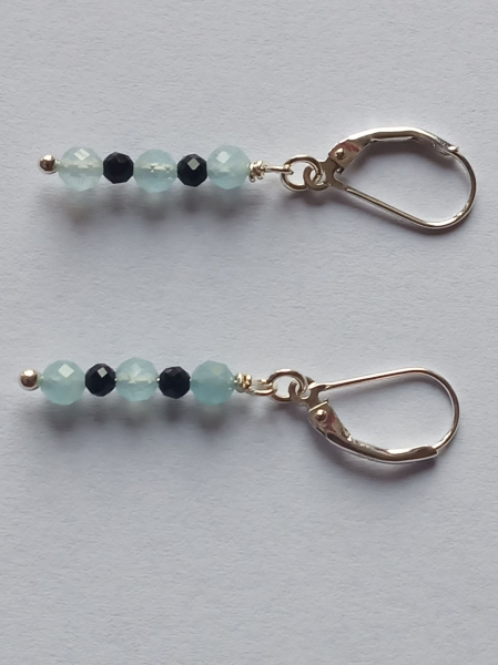 silver earrings-leverbacks with aquamarine and tourmaline beads-the colours are blue and black-