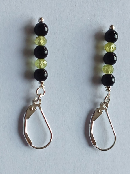 silver earrings-leverbacks with onyx and peridot beads-the colours are green and black---