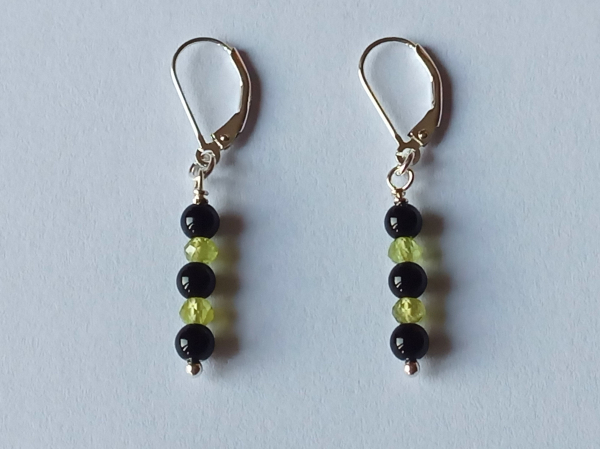 silver earrings-leverbacks with onyx and peridot beads-the colours are green and black