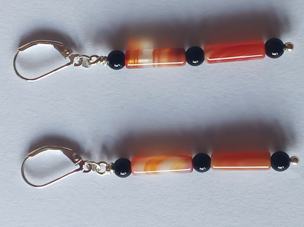 silver earrings-leverbacks with sardonyx tubes and onyx beads-the colours are red and black--