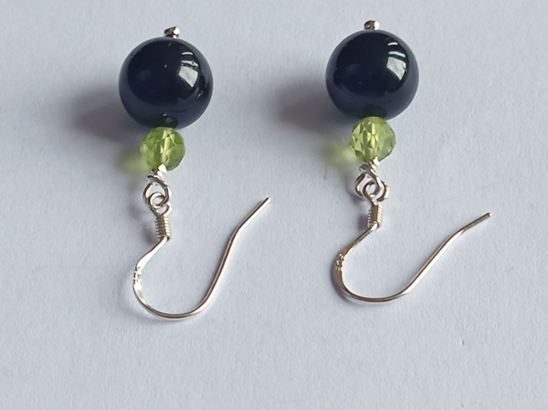 silver earrings-ear wires with tourmaline and peridot beads-the colour is black and green---